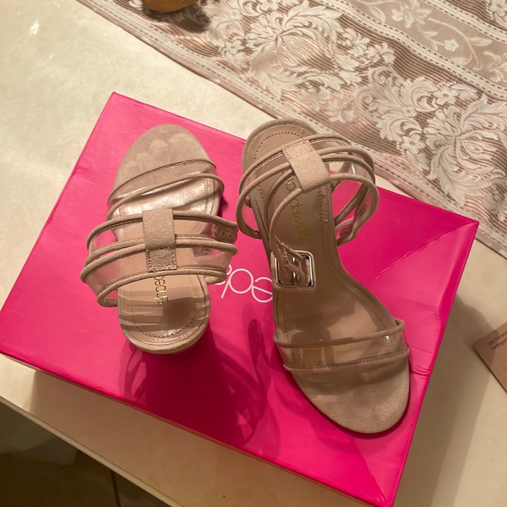 Heels worn a few times used but good condition